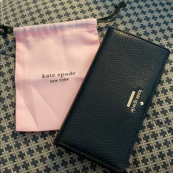 kate spade Handbags - Kate Spade Large Slim Bifold Wallet